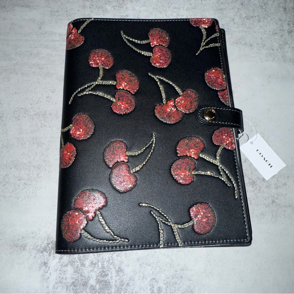 Coach black cherry print Notebook